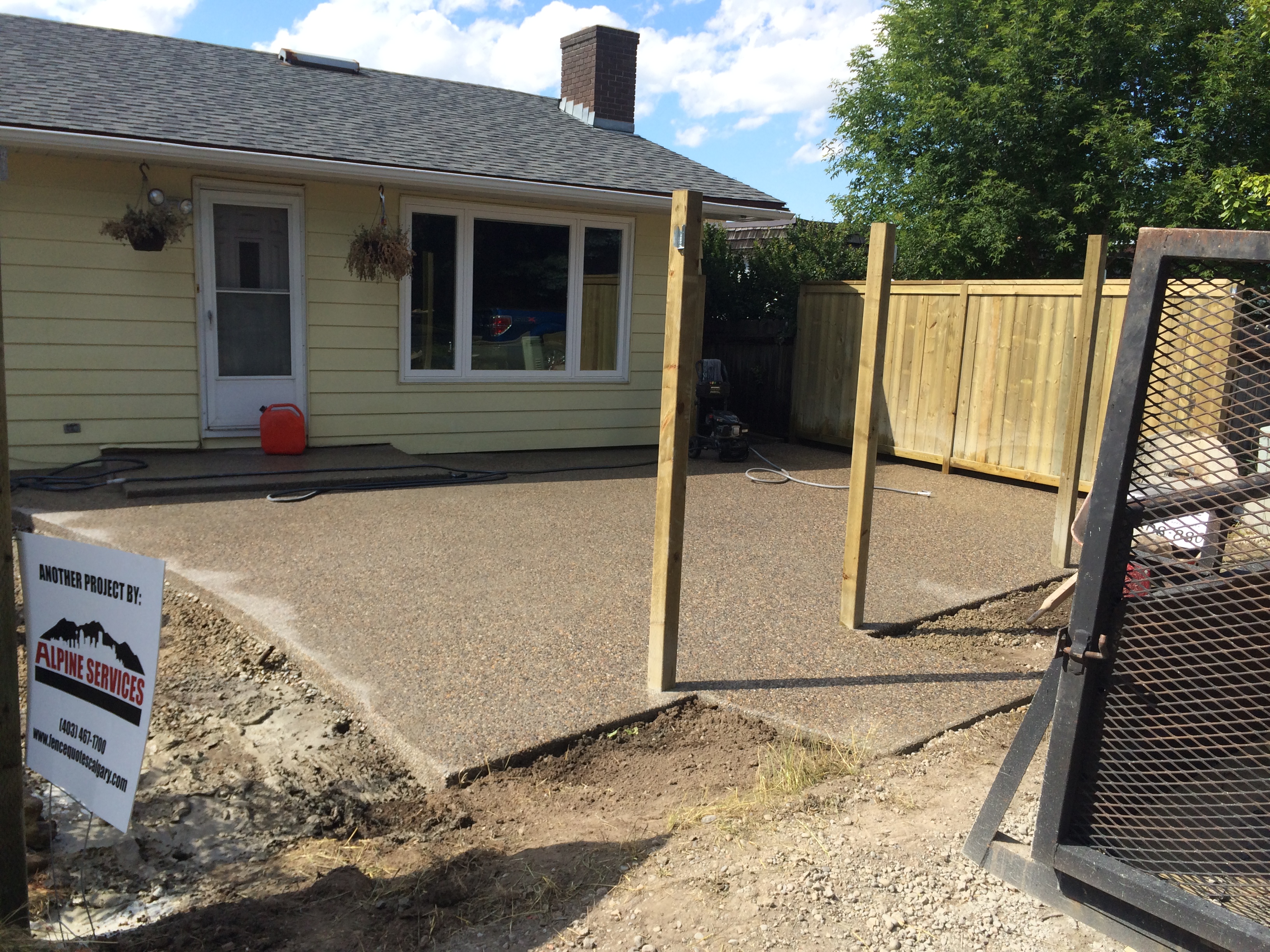 Stamped concrete patio with detailed finishing
